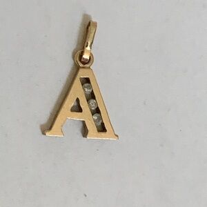 Letter “A” 10 kt gold charm/pendant